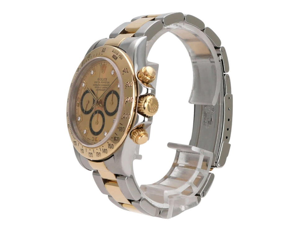 Rolex Daytona 40 Edelstahl Gelbgold 16523 Champagner Diamant seitliche Ansicht mit goldenen Akzenten.
