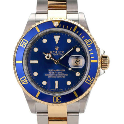Rolex Submariner Date 16613 aus Edelstahl und Gold mit blauem Zifferblatt und drehbarer Lünette.
