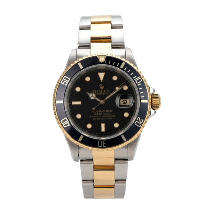 Rolex Submariner Date 16613 Edelstahl Gelbgold Schwarz mit schwarzem Ziffernblatt und drehbarer Lünette.