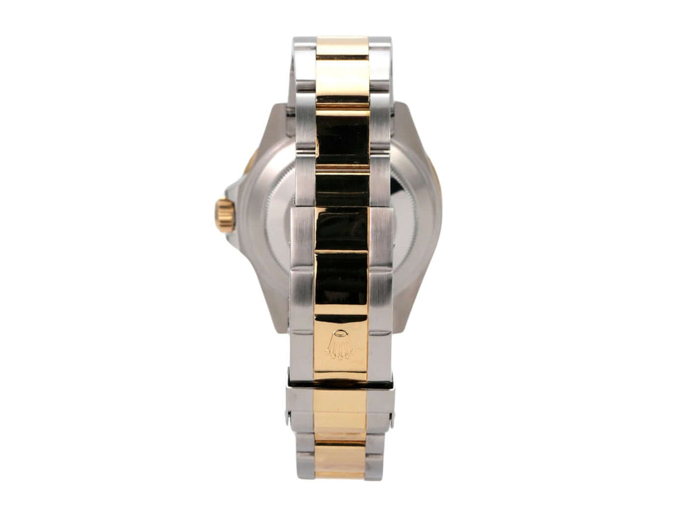Rolex Submariner Date 16613 Edelstahl Gelbgold Schwarz Ansicht von der Seite mit Edelstahl- und Gelbgold-Armband.