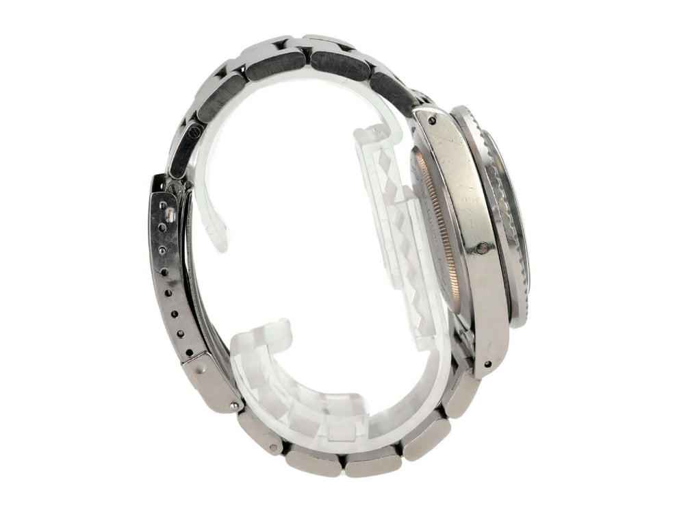 Seitenansicht der Rolex Sea-Dweller 1665 Double Red mit poliertem und satinierter Edelstahl-Lünette.