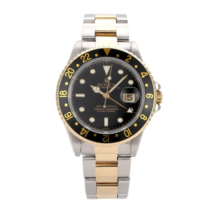 Rolex GMT-Master II 16713 Edelstahl Gelbgold 40 mm, schwarzes Zifferblatt, drehbare Lünette, luxuriöses Design.