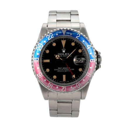 Rolex GMT Master Pepsi Ref. 1675 mit schwarzem Zifferblatt und drehbarer Lünette in blau/rot.