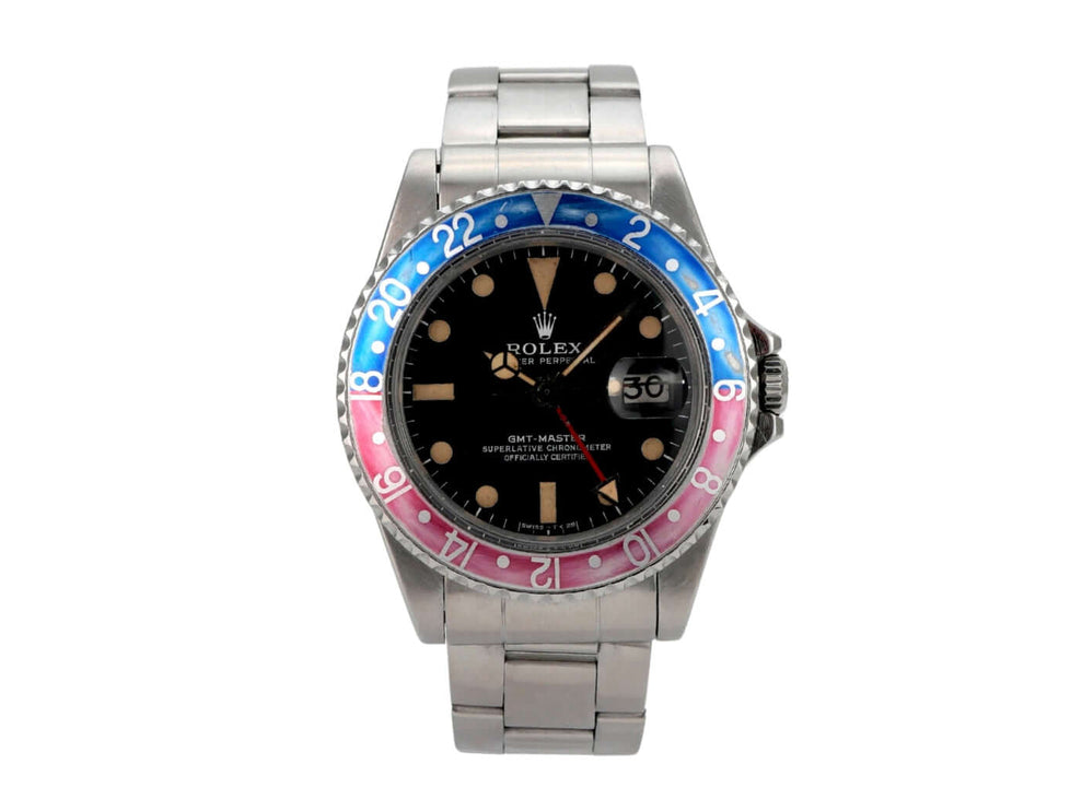 Rolex GMT Master Pepsi Ref. 1675 mit schwarzem Zifferblatt und drehbarer Lünette in blau/rot.