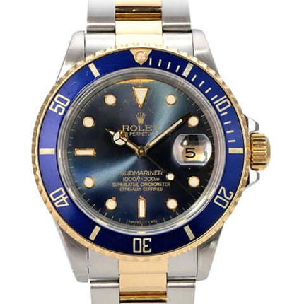 Rolex Submariner Date 16803 mit gelbgoldener Lünette, blauem Zifferblatt und Edelstahl-Gelbgold-Armband.