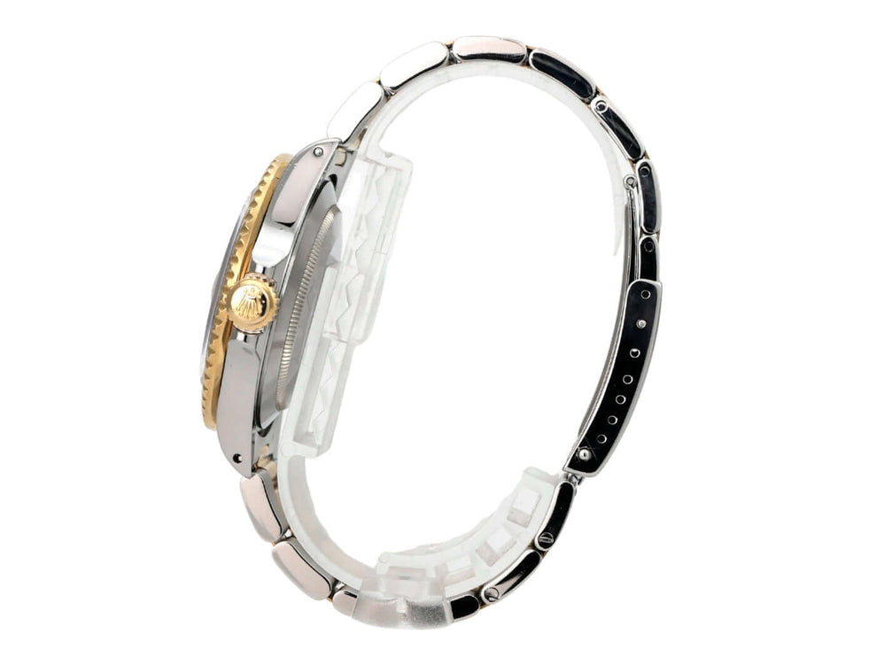 Rolex Submariner Date 16803 seitliche Ansicht des Edelstahl- und Gelbgold-Armbands der Uhr.