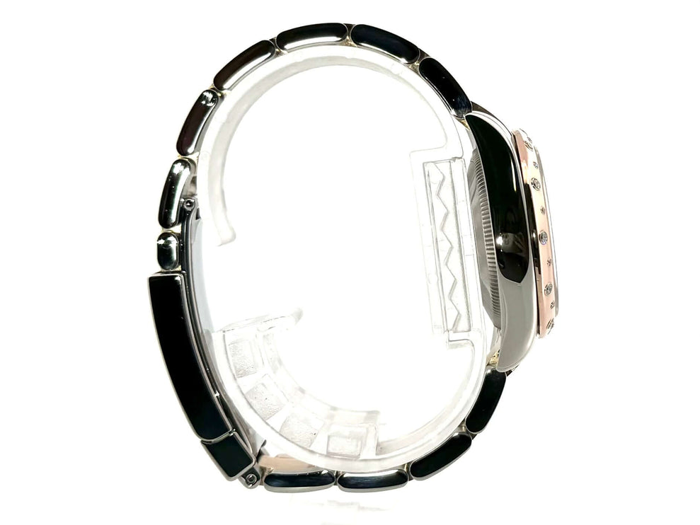 Seitenansicht der Rolex Datejust 31 Edelstahl Everose-Gold mit poliertem und satiniertem Edelstahlarmband und Diamantenlünette.