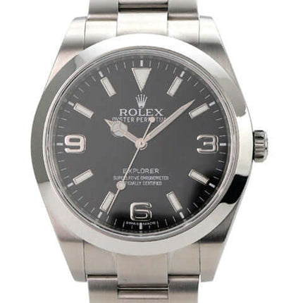 Rolex Explorer I Edelstahl 214270 mit schwarzem Zifferblatt und glänzendem Edelstahlarmband.
