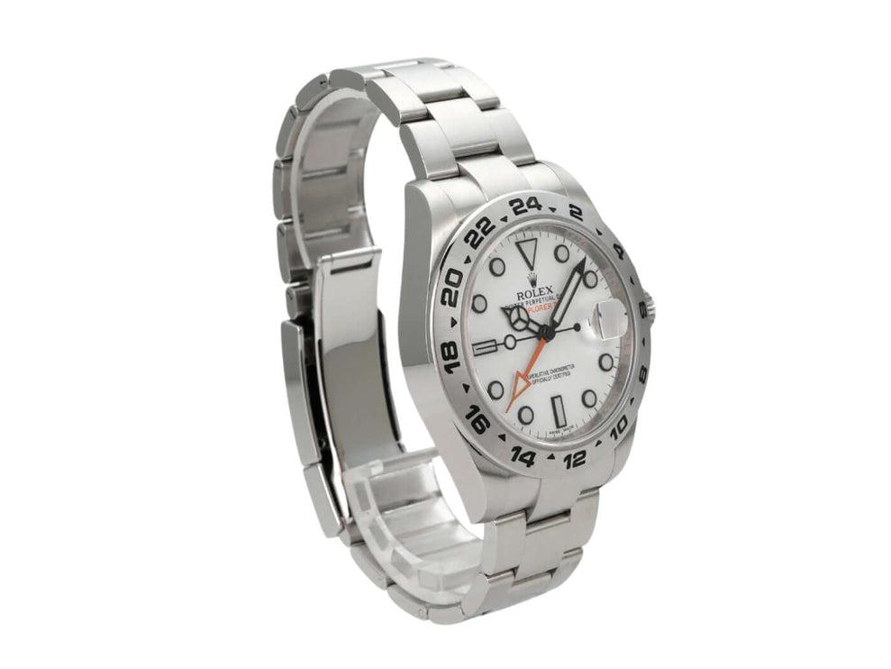 Rolex Explorer II 42 Edelstahl 216570 weißes Zifferblatt von der Seite mit leuchtenden Indizes und Edelstahlband.