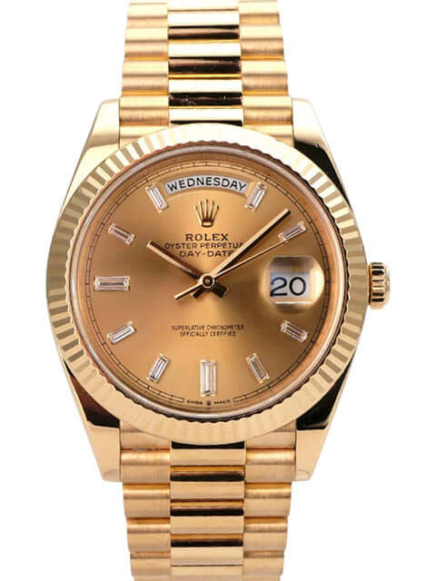 Rolex Day-Date 40 Gelbgold 228238 Champagner Diamant mit championfarbenem Zifferblatt und Präsident-Armband.