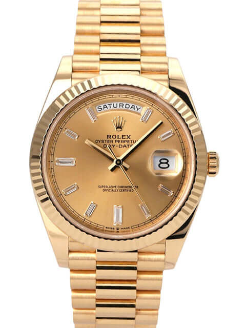 Rolex Day-Date 40 Gelbgold 228238 Champagner Diamant mit champagnerfarbenem Zifferblatt und gelbgoldenem Armband.