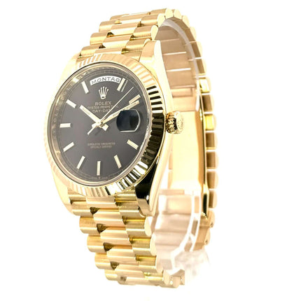 Rolex Day-Date 40 Gelbgold Ref. 228238 Schwarz aus 2019, 18 kt Gelbgoldgehäuse, schwarzes Zifferblatt, Präsident Armband, Datum und Wochentagsanzeige