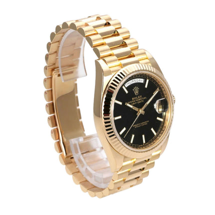 Rolex Day-Date 40 Gelbgold 228238 Schwarz mit schwarzem Zifferblatt und goldenem Armband