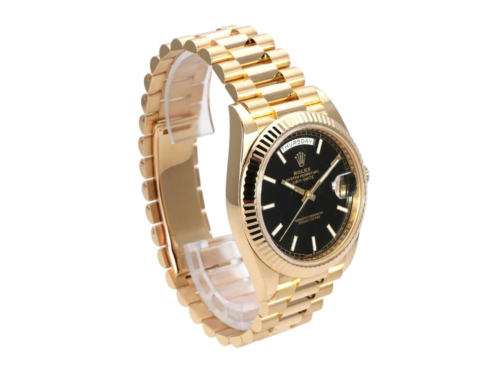 Rolex Day-Date 40 Gelbgold 228238 Schwarz mit schwarzem Zifferblatt und goldenem Armband