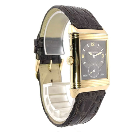 Jaeger-LeCoultre Reverso 270.140.544 Armbanduhr mit poliertem 18 kt Gelbgold-Gehäuse, braunem Alligatorleder Armband und schwarzem Zifferblatt.