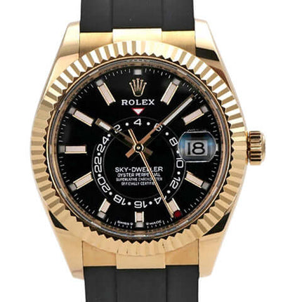 Rolex Sky-Dweller Gelbgold auf Oysterflex mit schwarzem Zifferblatt und Datum, Ref. 336238, 42 mm Gehäuse.