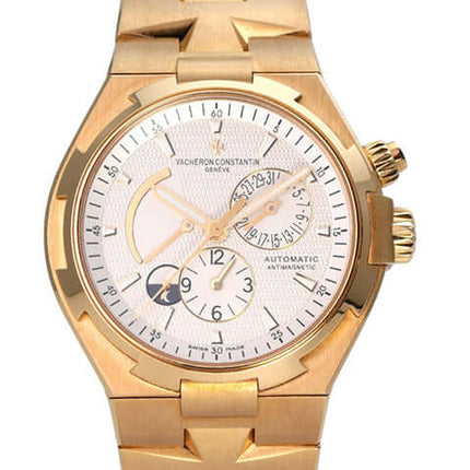 Vacheron Constantin Overseas Dual Time 47450/B01J-9228 in Gelbgold mit silberfarbenem Zifferblatt und Automatikwerk.
