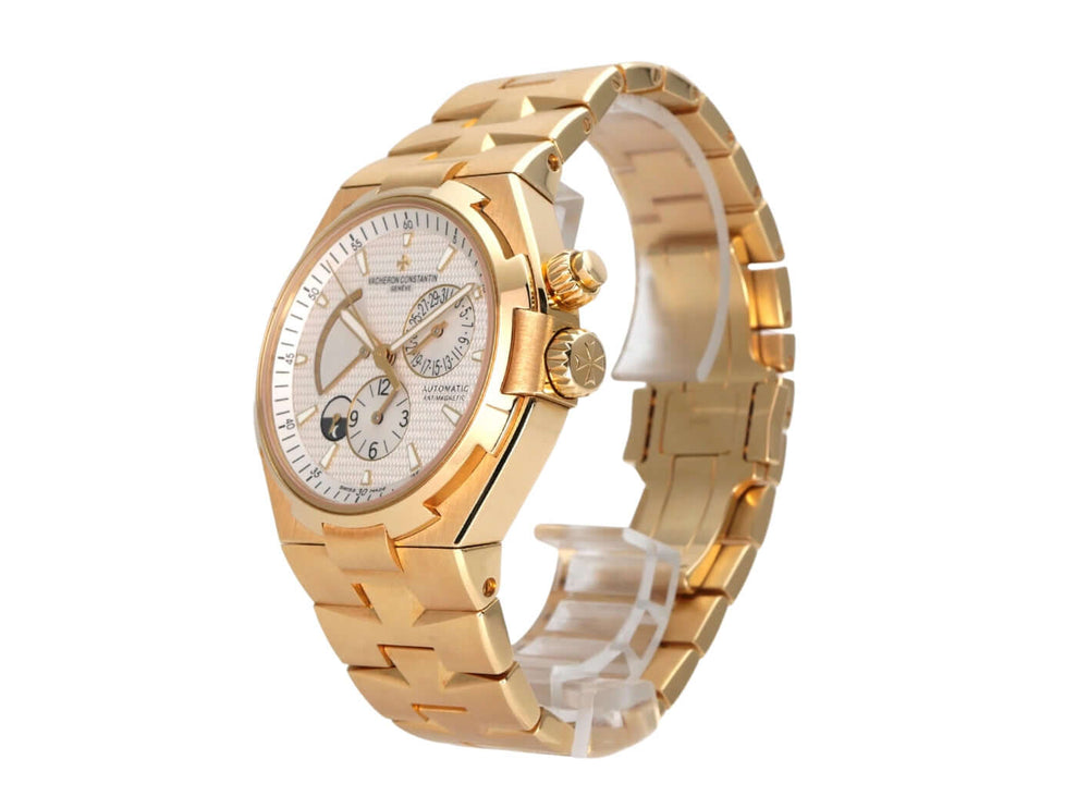 Vacheron Constantin Overseas Dual Time 47450/B01J-9228 in polished yellow gold with a silver dial and automatic movement.