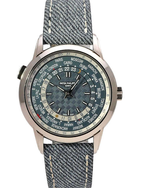 Patek Philippe World Time 5330G-001 mit 18 kt Weißgold Gehäuse und Jeansband, blau/grau Zifferblatt.