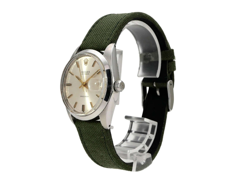 Rolex Oyster Date 34 Ref. 6694 Silber Vintage Herrenuhr mit grünem Textilband und silbernem Zifferblatt