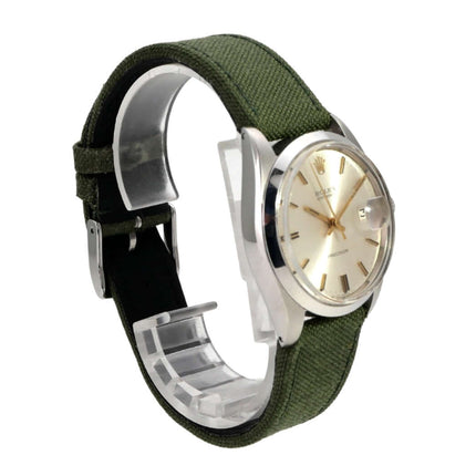 Rolex Oyster Date 34 Ref. 6694 Silber mit Edelstahlgehäuse, silbernem Zifferblatt und grünem Textilband