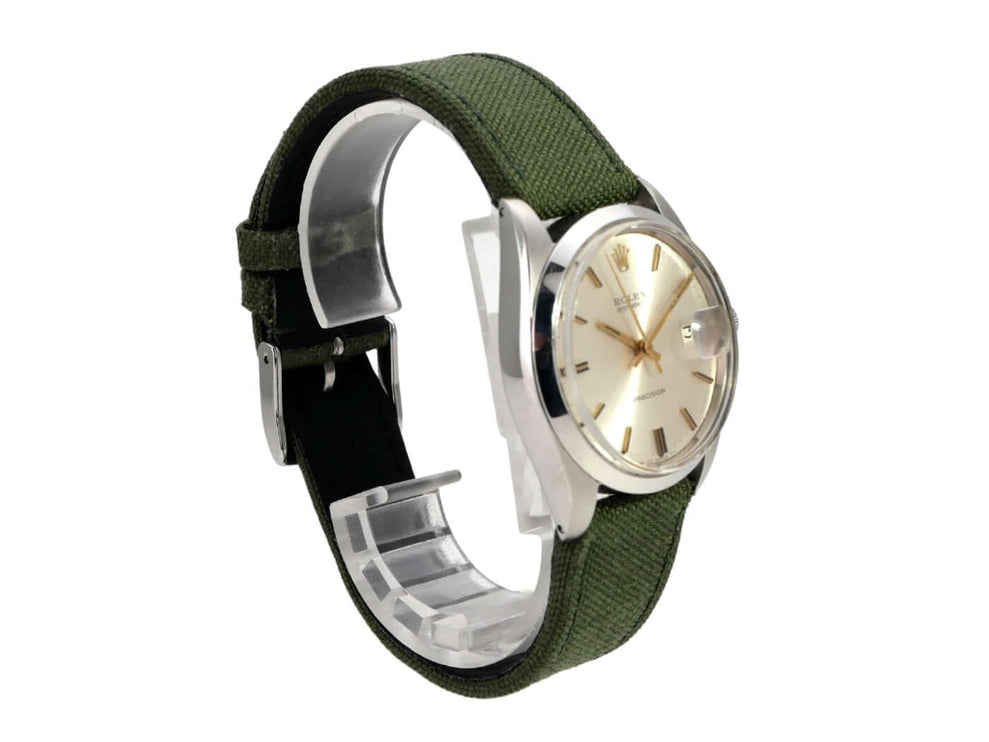 Rolex Oyster Date 34 Ref. 6694 Silber mit Edelstahlgehäuse, silbernem Zifferblatt und grünem Textilband
