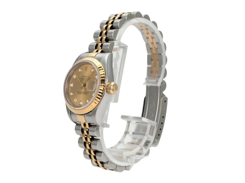 Rolex Datejust 26 Edelstahl Gelbgold Ref. 69173 Champagner Diamant an einem Handgelenk mit poliertem Armband.