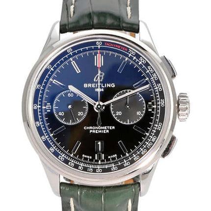 Breitling Premier B01 Chronograph 42 in Edelstahl mit grünem Krokolederarmband und schwarzem Zifferblatt.