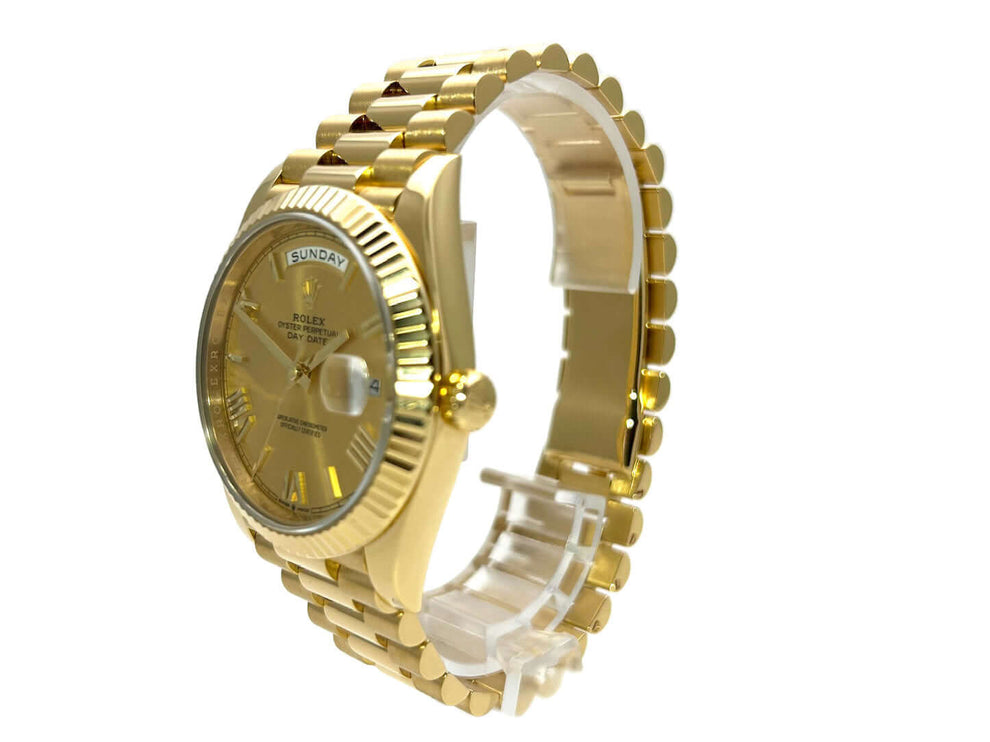 Rolex Day-Date 40 Gelbgold 228238 Champagner Römisch, 18 kt Gelbgold Gehäuse, Präsident Armband, geriffelter Lünette, aus 2020, Automatikwerk.
