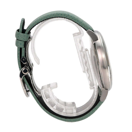 MB&F M.A.D.2 Editions Green Uhr mit grünem Lederband und poliertem Edelstahlgehäuse von der Seite.