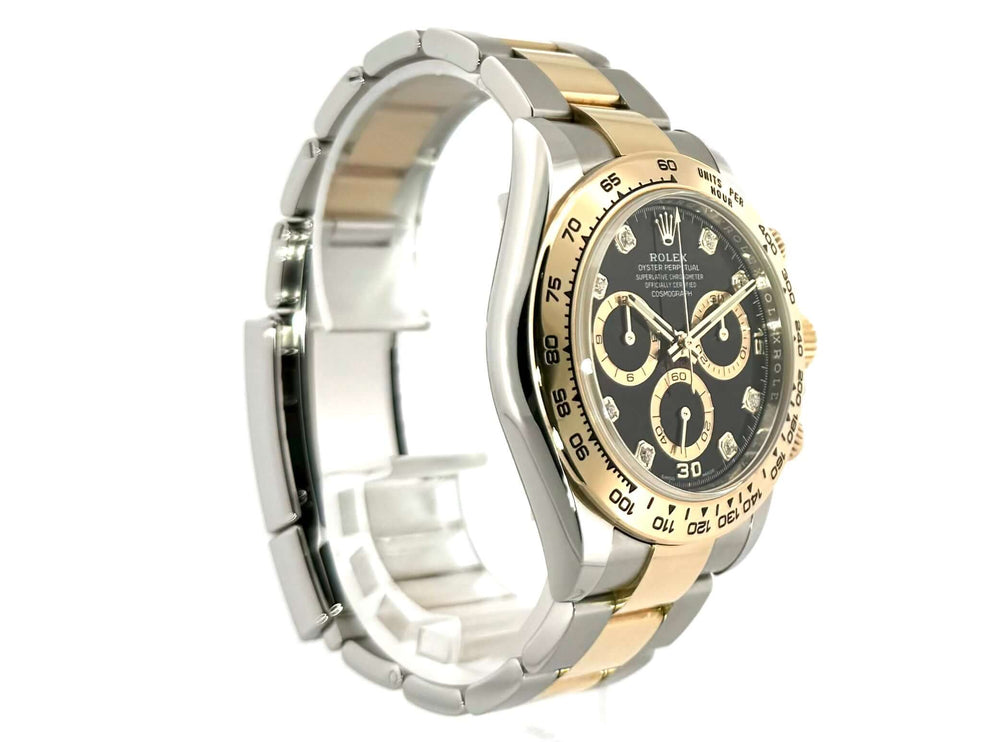 Rolex Daytona Edelstahl Gelbgold 116503 mit schwarzem Diamantzifferblatt und Tachymeterlünette.