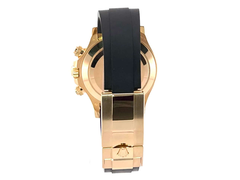 Rückseite der Rolex Daytona 116518LN in 18 kt Gelbgold mit schwarzem Oysterflex-Band und Faltschließe, Automatikwerk Manufakturkaliber 4130.