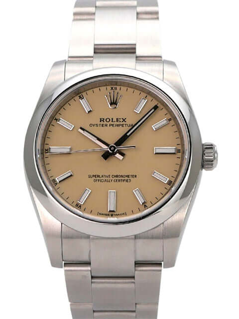 Rolex Oyster Perpetual 34 mm 124200 Beige Uhr mit beigem Zifferblatt und Edelstahlband.