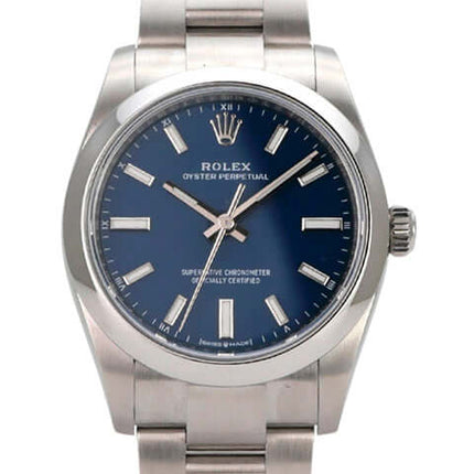 Rolex Oyster Perpetual 34 mm 124200 Med-Blue Herrenuhr mit blauem Zifferblatt und Edelstahlband.