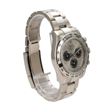 Rolex Daytona Weißgold 126509 Grau - Seitenansicht mit verschraubbarer Krone und Flankenschutz.