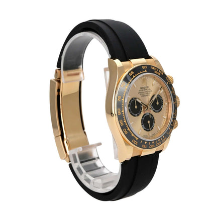 Rolex Daytona 126518LN Gelbgold Oysterflex Champagner mit schwarzem Band und champagnerfarbenem Zifferblatt.