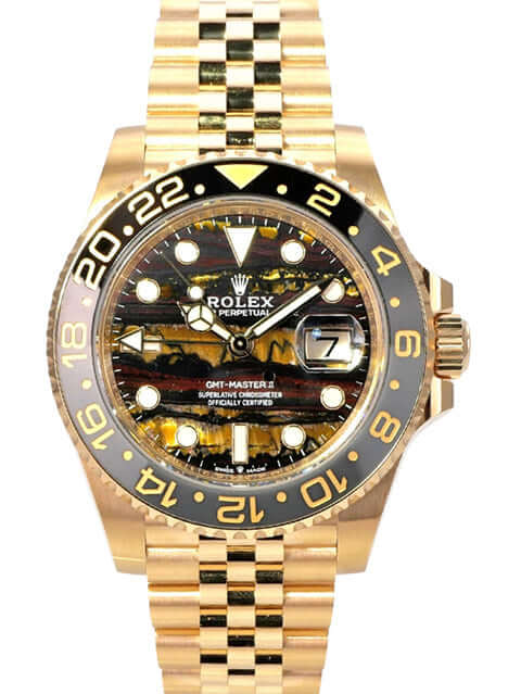 Rolex GMT-Master II Gelbgold 126718GRNR Tigereisen mit schwarzer Cerachrom-Lünette und Jubilee-Band.