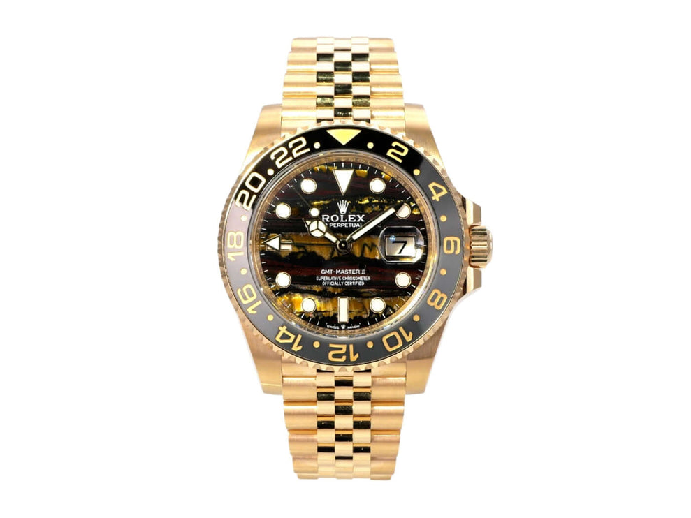 Rolex GMT-Master II Gelbgold 126718GRNR Tigereisen mit 18k Gelbgold und schwarzer Cerachrom-Zahlenscheibe.