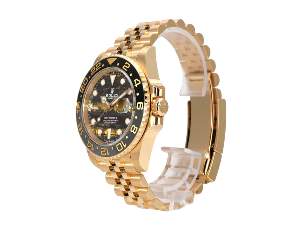 Rolex GMT-Master II Gelbgold 126718GRNR Tigereisen mit schwarzem Zifferblatt und Jubilee-Band aus 18k Gelbgold.