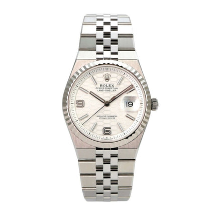 Rolex Land-Dweller 36 Oystersteel Weißgold 127234 Tiefweiß Wabe Flat Jubile-Band mit poliertem Edelstahl und Wabenmuster.