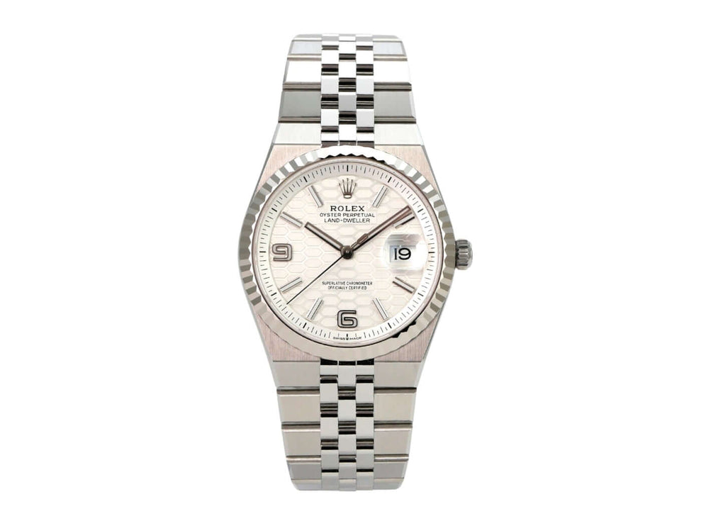 Rolex Land-Dweller 36 Oystersteel Weißgold 127234 Tiefweiß Wabe Flat Jubile-Band mit poliertem Edelstahl und Wabenmuster.