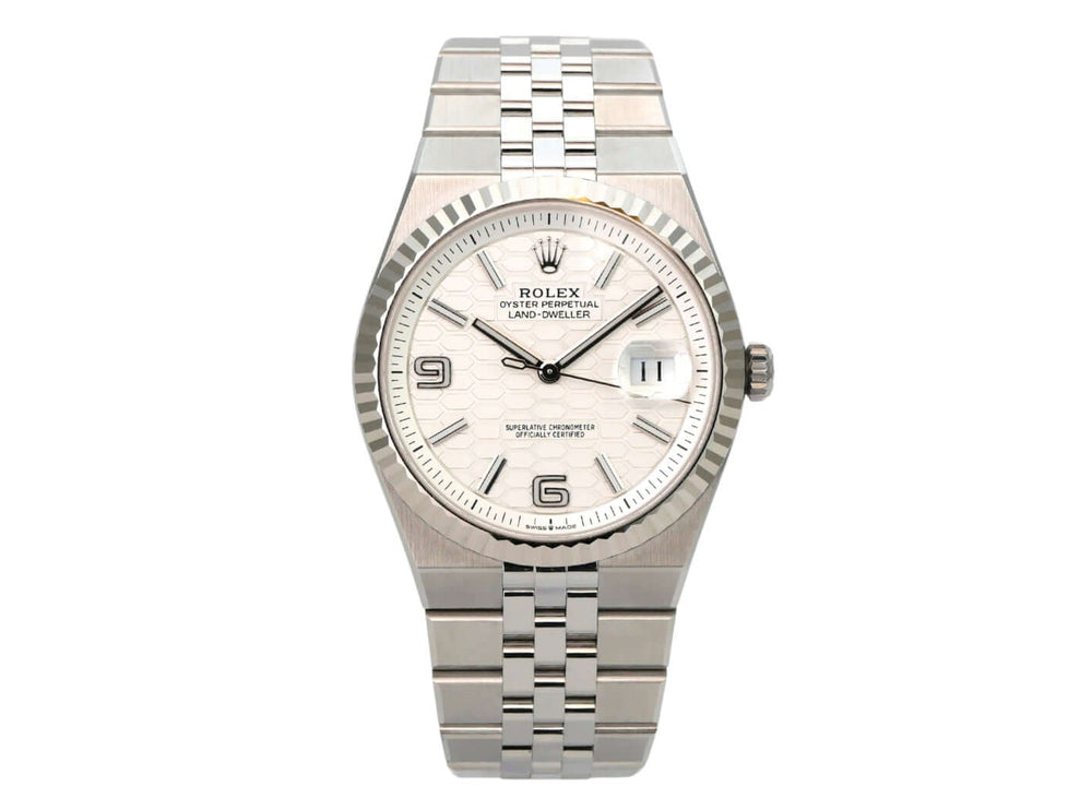 Rolex Land-Dweller 40 Oystersteel Weißgold 127334 Tiefweiß Wabe Flat Jubile-Band am Handgelenk