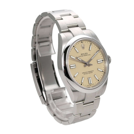 Rolex Oyster Perpetual 41 Ref. 134300 mit beigem Zifferblatt und Edelstahlarmband, wasserfest bis 10 bar.