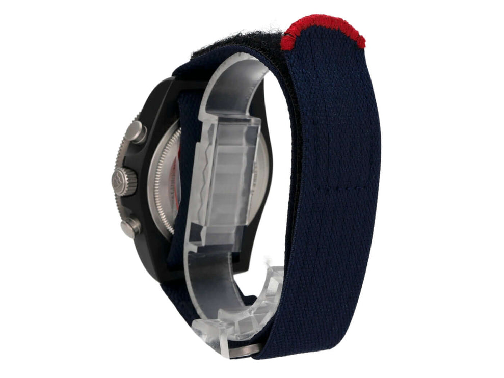 Tudor Pelagos FXD Chrono M25807KN-0001 Alinghi Red Bull Racing Edition mit blauem Textilband und Klettschließe.