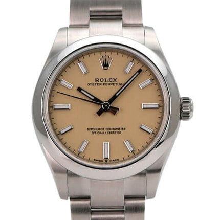 Rolex Oyster Perpetual 31 Ref. 277200 Beige, Edelstahl, beiges Zifferblatt, Automatik, 31mm, wasserdicht bis 10 bar.