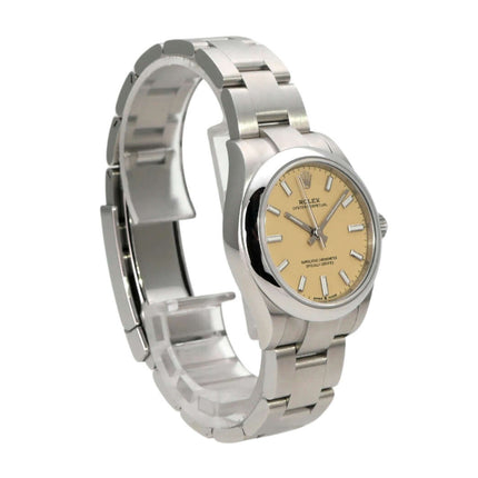 Rolex Oyster Perpetual 31 Ref. 277200 Beige Armbanduhr aus Edelstahl mit beigem Zifferblatt und Automatikwerk.