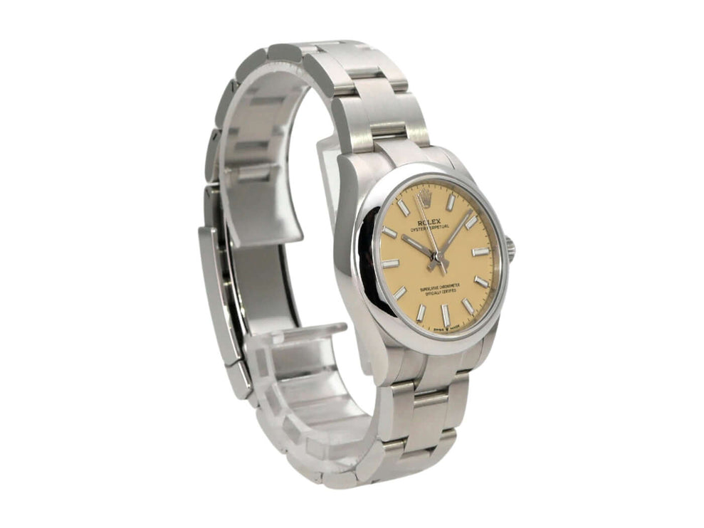 Rolex Oyster Perpetual 31 Ref. 277200 Beige Armbanduhr aus Edelstahl mit beigem Zifferblatt und Automatikwerk.