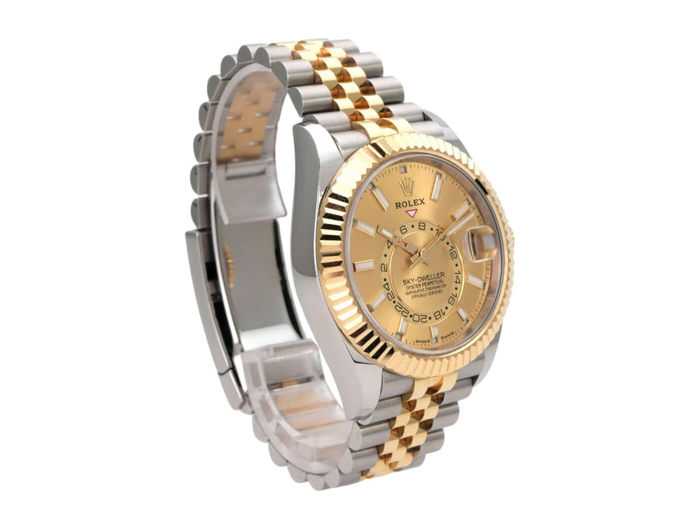 Rolex Sky-Dweller Edelstahl Gelbgold 336933 Champagner Jubile-Band Uhr mit glänzendem Zifferblatt und Jubilee-Armband.