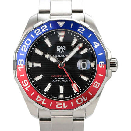 TAG Heuer Aquaracer Calibre 7 WAY201F.BA0927 Twin-Time mit schwarzem Zifferblatt und rot-blauer Lünette aus Edelstahl.