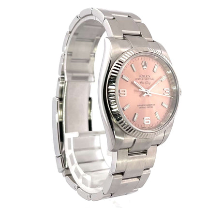 Rolex Air King Ref. 114234 mit rosa Zifferblatt und arabischen Ziffern, Edelstahlgehäuse, Weißgoldlünette, Oyster-Stahlarmband.
